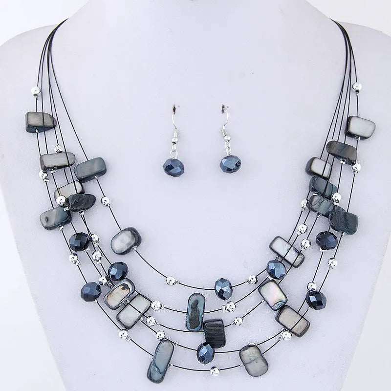 Women bohemian African beads multilayer necklace and matching earrings set with black and silver beads