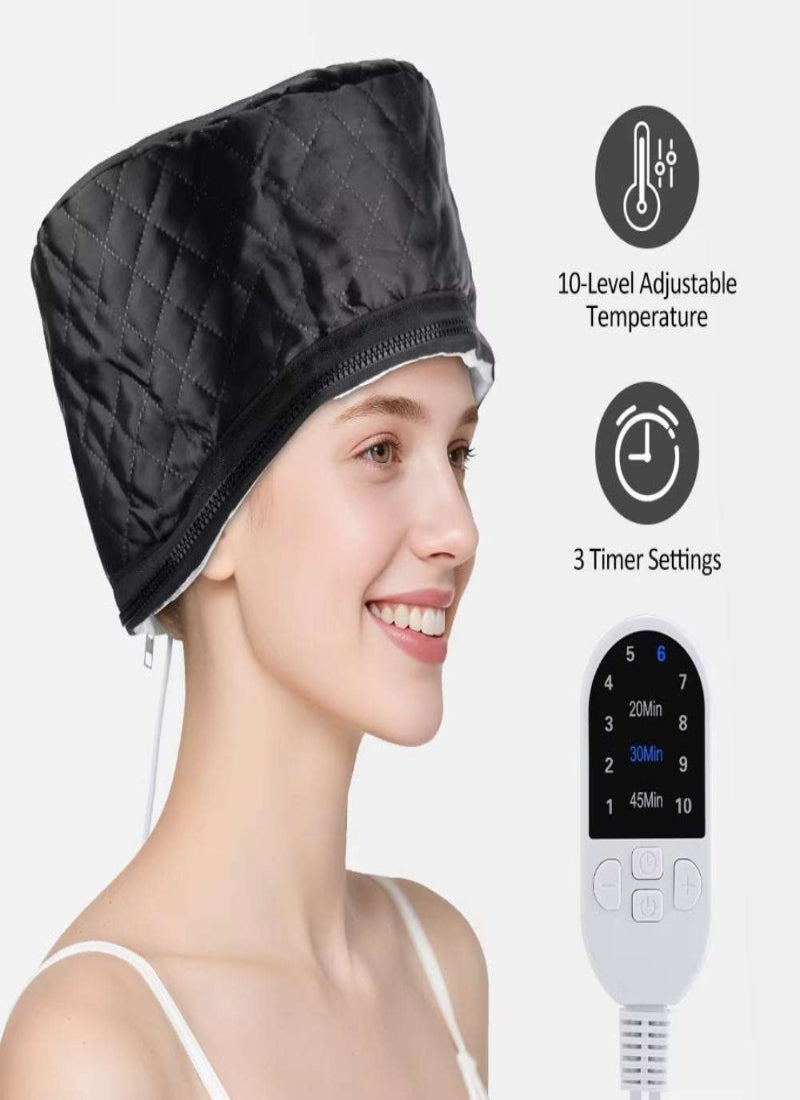 Woman wearing black portable electric thermal hat with 10-level adjustable temperature and 3 timer settings controller for hair treatment