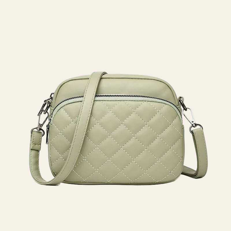 Diamond lattice pattern women's shoulder bag in light green PU leather with adjustable strap and front zipper pocket