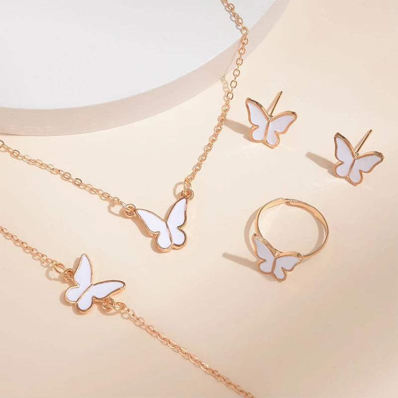 Butterfly Pendants Necklace jewelry set with necklace, bracelet, earrings, and ring in gold-tone alloy with white butterfly accents