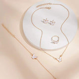 Butterfly pendants necklace set with earrings, ring, and bracelet in gold alloy with white enamel butterfly design
