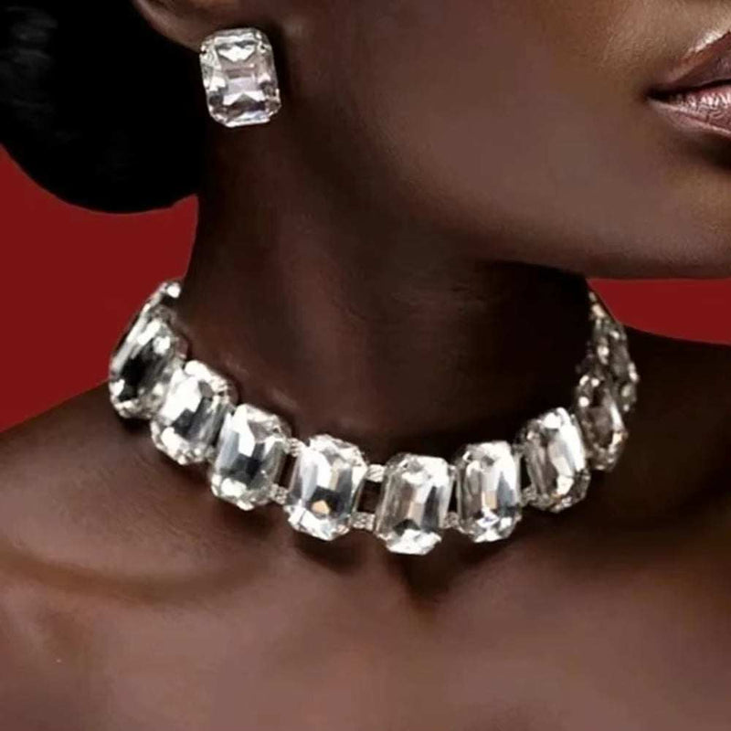 Stonefans Bride Crystal Necklace Earrings Set with large rectangular crystals on dark skin against red background
