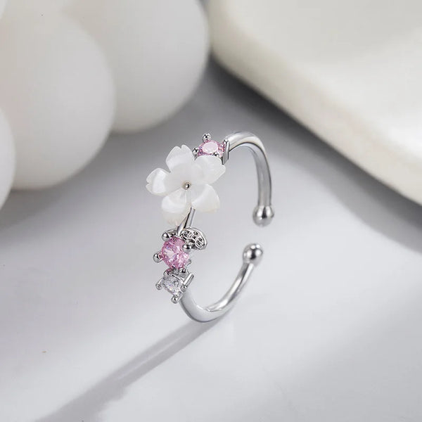 Silver open pink romantic flower ring with white petals and zircon stones