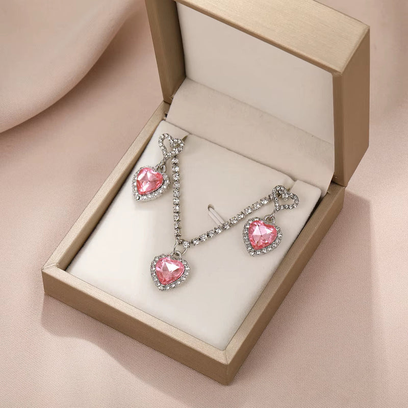 Fashion Heart Zircon necklace and earrings set with pink heart-shaped stones in beige gift box