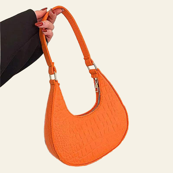Orange felt ball purse for teenagers with shoulder strap and zipper closure