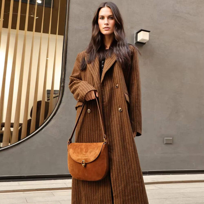 Luxury Brand Rodeo Women Bags brown suede leather shoulder crossbody bag with flap closure worn by woman in brown coat
