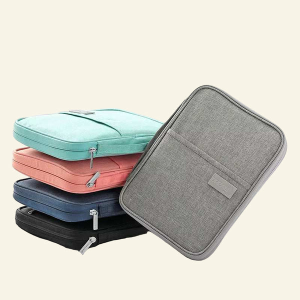 Waterproof passport holders in blue, pink, navy, black, and grey colors stacked with zipper closures
